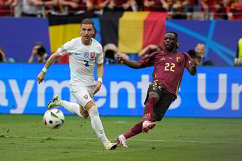 Jeremy Doku and Peter Pekarik